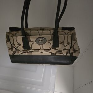 Elegant Black and Tan Coach Purse